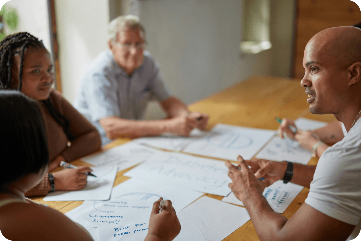 ShopAtix team collaborating at a table